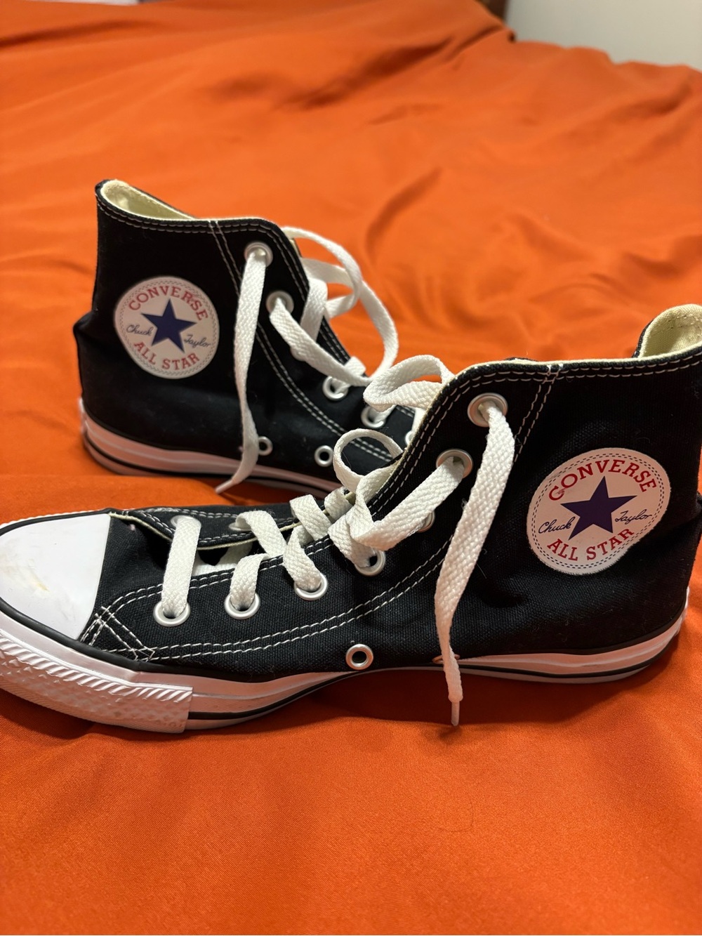 Converse Black & White High Top Chuck Taylor Sneakers